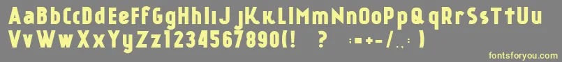 KР°nkinFREE FONT-Schriftart – Gelbe Schriften auf grauem Hintergrund