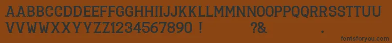 fuente La Deco Klan – Fuentes Negras Sobre Fondo Marrón