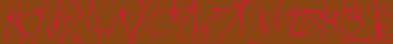 フォントLa lune – 赤い文字が茶色の背景にあります。