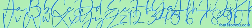 フォントLa Paloma – 青い文字は緑の背景です。
