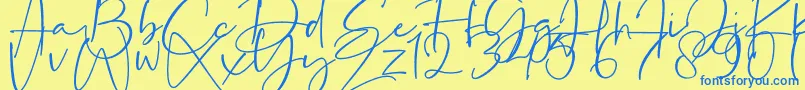 フォントLa Paloma – 青い文字が黄色の背景にあります。