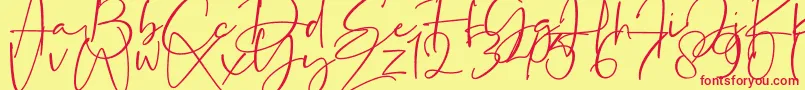 La Paloma-Schriftart – Rote Schriften auf gelbem Hintergrund