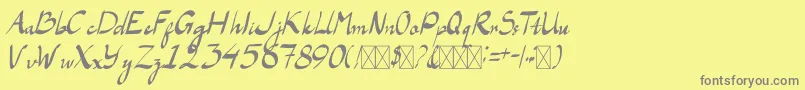 フォントLaAladdins – 黄色の背景に灰色の文字