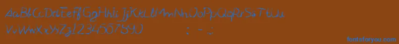 CfmanifestoRegular Font – Blue Fonts on Brown Background