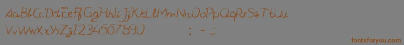 CfmanifestoRegular-Schriftart – Braune Schriften auf grauem Hintergrund