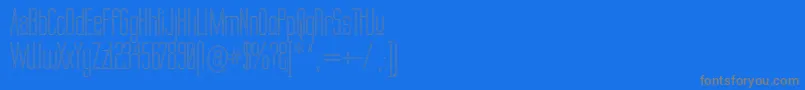 Labtop Upper Outline-Schriftart – Graue Schriften auf blauem Hintergrund