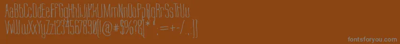 Labtop Warp 1 Font – Gray Fonts on Brown Background