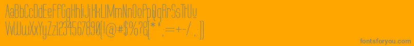 LABTUP  -Schriftart – Graue Schriften auf orangefarbenem Hintergrund