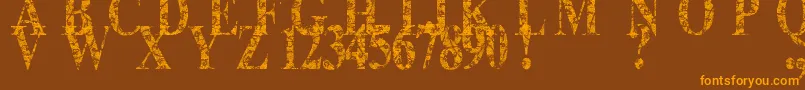 フォントLace Dreams – オレンジ色の文字が茶色の背景にあります。