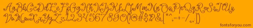 Lacoruna -Schriftart – Braune Schriften auf orangefarbenem Hintergrund