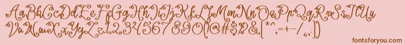 Lacoruna -Schriftart – Braune Schriften auf rosa Hintergrund