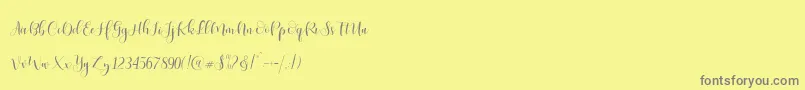 Ladies Scriptフォントについての詳細 フォントLadies Script – 黄色の背景に灰色の文字