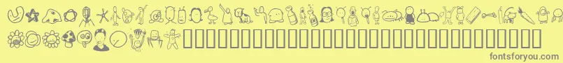 Tombats4 Font – Gray Fonts on Yellow Background