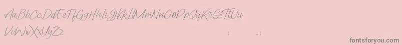 Lady Writer Skinny FREE-Schriftart – Graue Schriften auf rosa Hintergrund