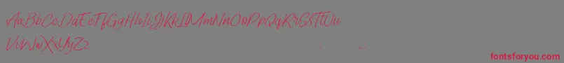 Lady Writer Skinny FREE Font – Red Fonts on Gray Background