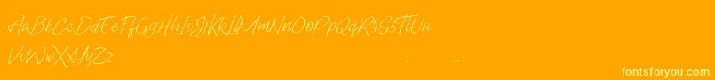 Lady Writer Skinny FREE Font – Yellow Fonts on Orange Background