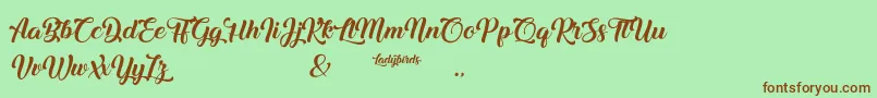 Ladybirds Font – Brown Fonts on Green Background