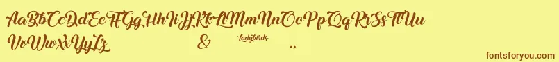 Ladybirds Font – Brown Fonts on Yellow Background