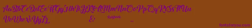 Ladybirds Font – Purple Fonts on Brown Background