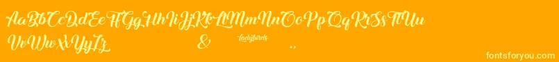 Ladybirds Font – Yellow Fonts on Orange Background