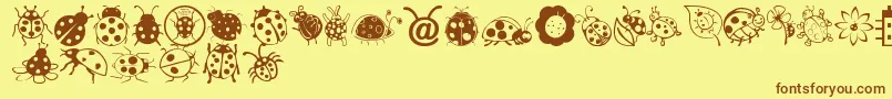 Ladybug Dings Font – Brown Fonts on Yellow Background