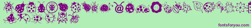 Ladybug Dings Font – Purple Fonts on Green Background