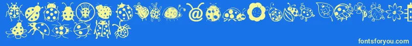 Ladybug Dings Font – Yellow Fonts on Blue Background