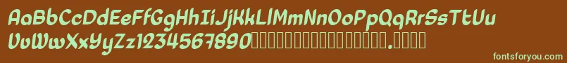 Laedoomai Italic-fontti – vihreät fontit ruskealla taustalla