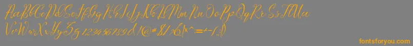 フォントLagena – オレンジの文字は灰色の背景にあります。