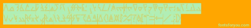 LAGGTASTIC Hollow Inverse-Schriftart – Grüne Schriften auf orangefarbenem Hintergrund