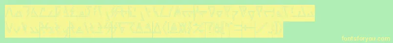 フォントLAGGTASTIC Hollow Inverse – 黄色の文字が緑の背景にあります