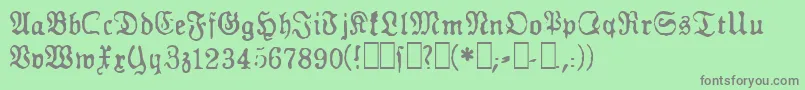 フォントGfGesetz – 緑の背景に灰色の文字