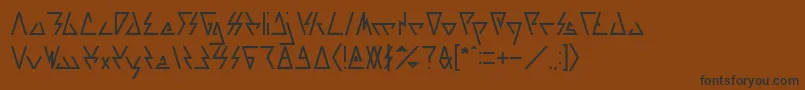 フォントLAGGTASTIC – 黒い文字が茶色の背景にあります