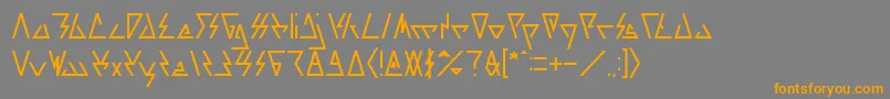 フォントLAGGTASTIC – オレンジの文字は灰色の背景にあります。