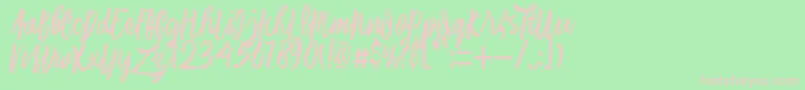 Laksana Typeface-fontti – vaaleanpunaiset fontit vihreällä taustalla