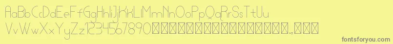 lamborgini thin personal-Schriftart – Graue Schriften auf gelbem Hintergrund