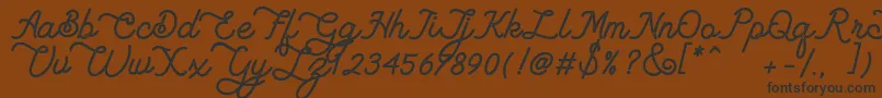 Lambretta Script Stamp Font – Black Fonts on Brown Background