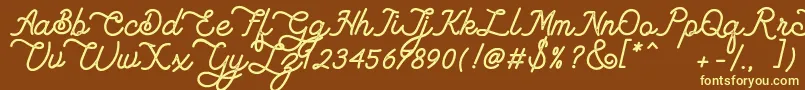 Шрифт Lambretta Script Stamp – жёлтые шрифты на коричневом фоне