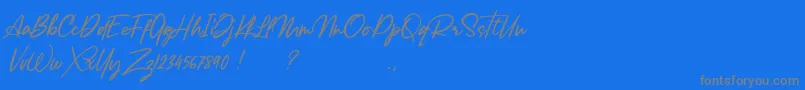 Lancaste Script Alt Demo-Schriftart – Graue Schriften auf blauem Hintergrund