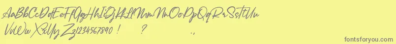 Lancaste Script Alt Demo-Schriftart – Graue Schriften auf gelbem Hintergrund
