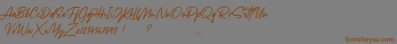 Lancaste Script Demo-Schriftart – Braune Schriften auf grauem Hintergrund