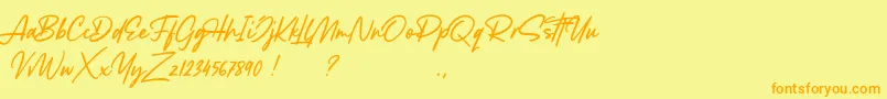 Fonte Lancaste Script Demo – fontes laranjas em um fundo amarelo