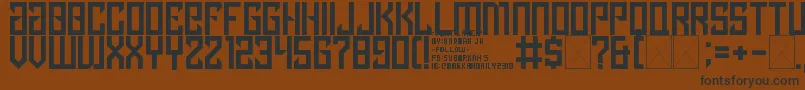 lancip Font – Black Fonts on Brown Background