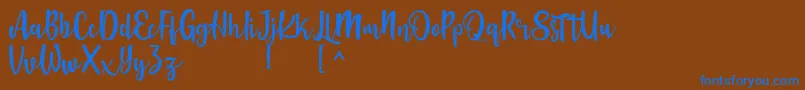 Langrish Script Font – Blue Fonts on Brown Background