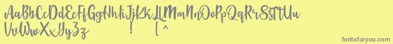 Langrish Script Font – Gray Fonts on Yellow Background