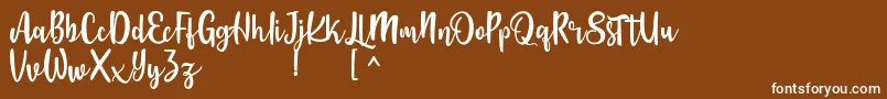 Langrish Script Font – White Fonts on Brown Background
