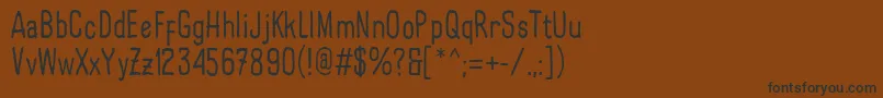 フォントLarispolHandwritten Regular – 黒い文字が茶色の背景にあります