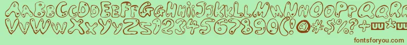 LARSON Font – Brown Fonts on Green Background