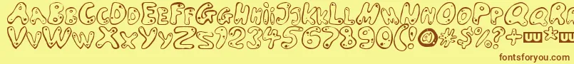 LARSON Font – Brown Fonts on Yellow Background