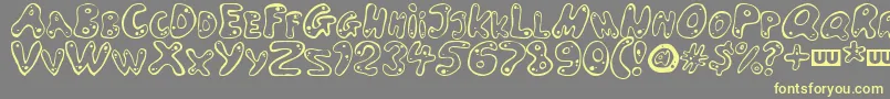 LARSON Font – Yellow Fonts on Gray Background